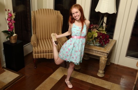 Tint redhead teen Dolly Little works over her pink cunt with sex toys and fist