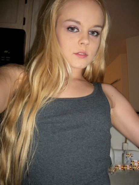 Petite amateur Bri Skies takes selfies while exposing her tits and pussy