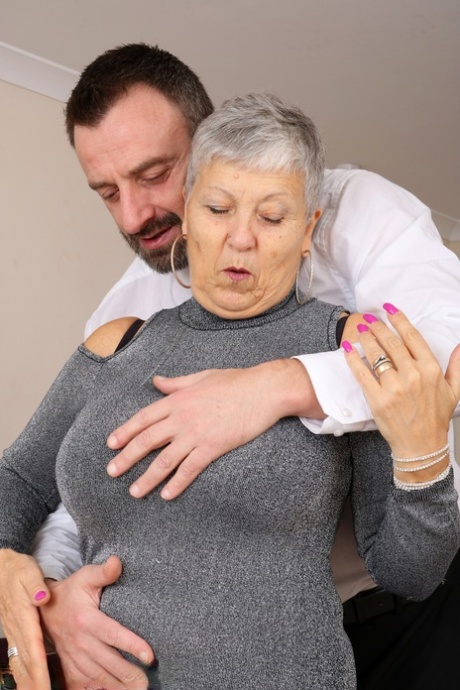 Older granny Savana bares big saggy tits to fuck young man's hard cock cowgirl