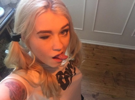 Beautiful blonde slut Misha Cross takes a selfie fully clothed and stark naked