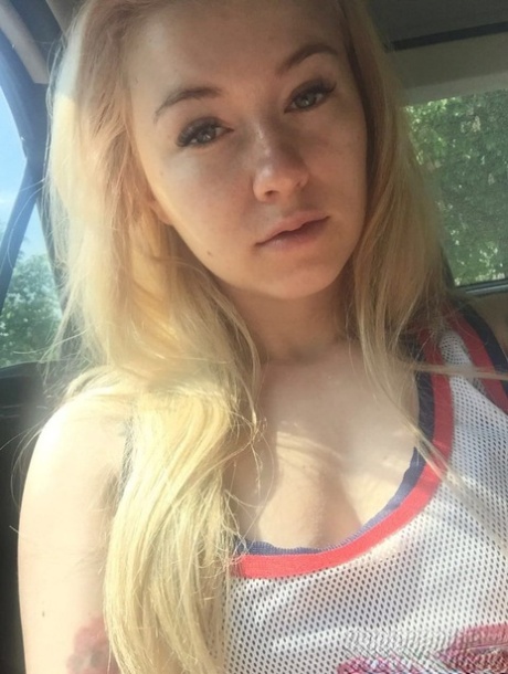 Beautiful blonde slut Misha Cross takes a selfie fully clothed and stark naked