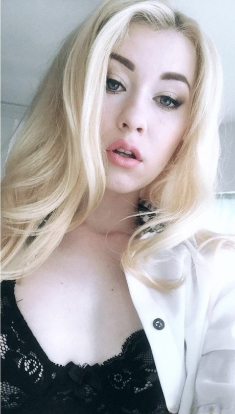 Beautiful blonde slut Misha Cross takes a selfie fully clothed and stark naked
