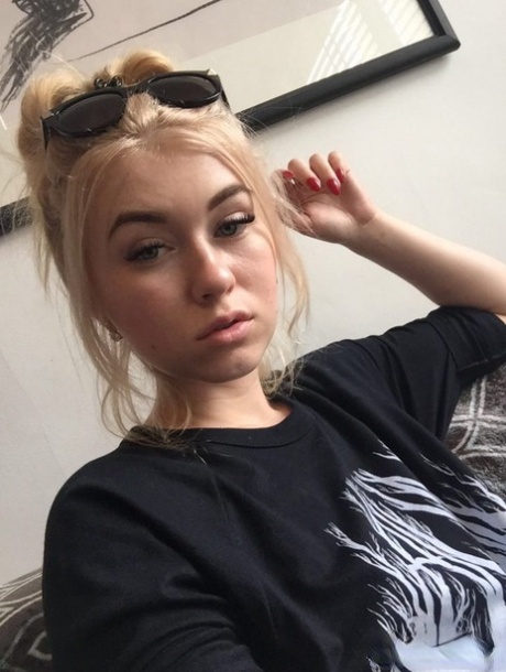 Beautiful blonde slut Misha Cross takes a selfie fully clothed and stark naked