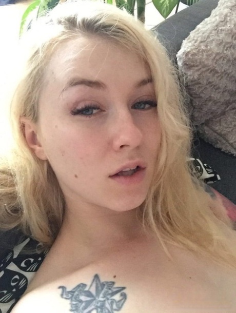 Beautiful blonde slut Misha Cross takes a selfie fully clothed and stark naked