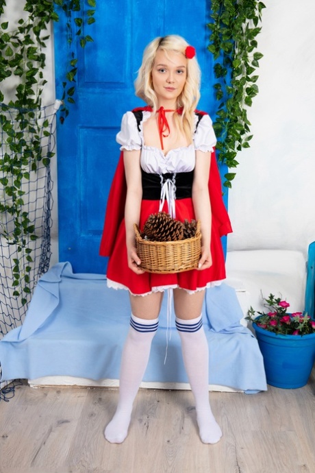 Adorable blonde teen Kapri doffs cosplay attire to pose bare naked
