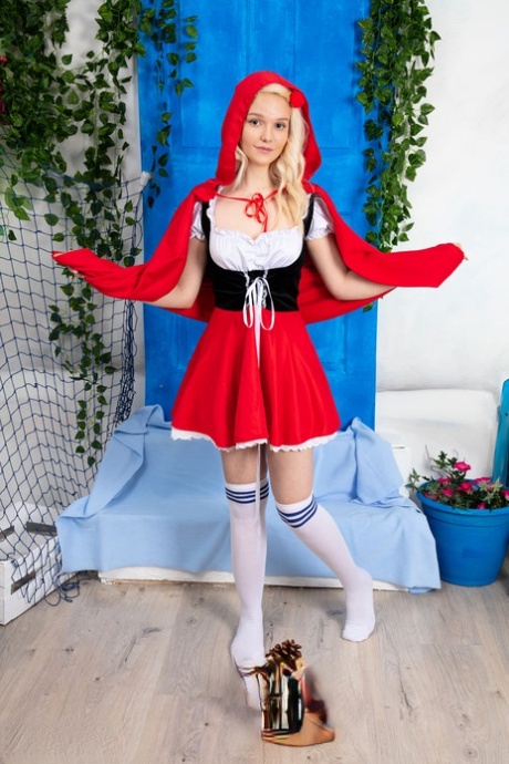 Adorable blonde teen Kapri doffs cosplay attire to pose bare naked