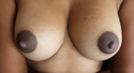 Beautiful Asian with huge dark nipples rubbing her smooth shaved pussy