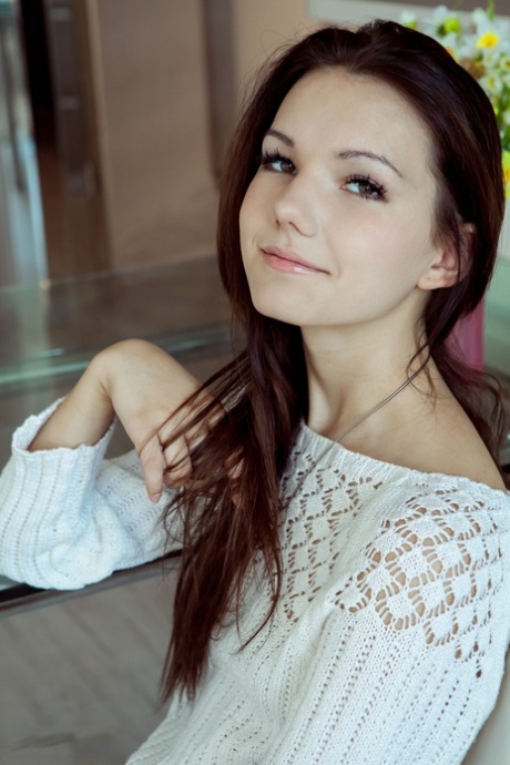 Stunning brunette Rogned spread naked showing her small teen tits and twat