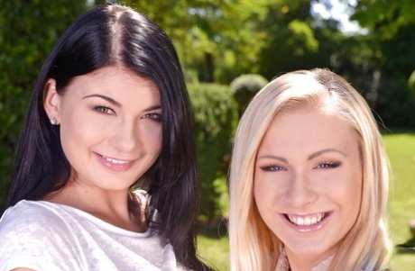Buxom Euro beauties Lucy Li and Vanessa Staylon having lesbians sex outside