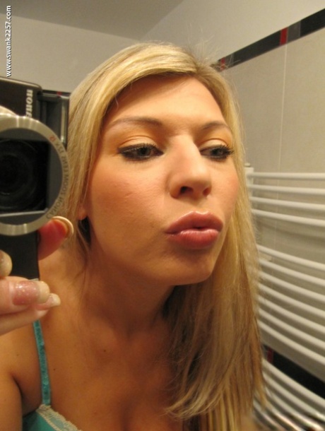 Blonde girlfriend with tiny tits Kristi Lust stripping and picturing herself