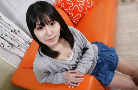 Asian teen Nana Ogami strips down and gets her hairy pussy fingered