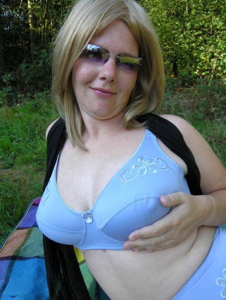 Hot mature with huge juggs and massive ass Mirabelle toys her cunt outdoors