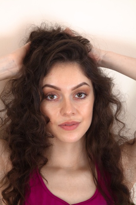 Pretty girl with a hot ass Anastasia reveals her hairy vagina on the floor