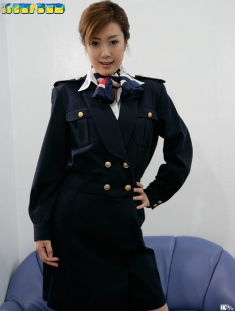 Asian stewardess Risako Konno unveils her nice boobs and hairy pussy in a solo