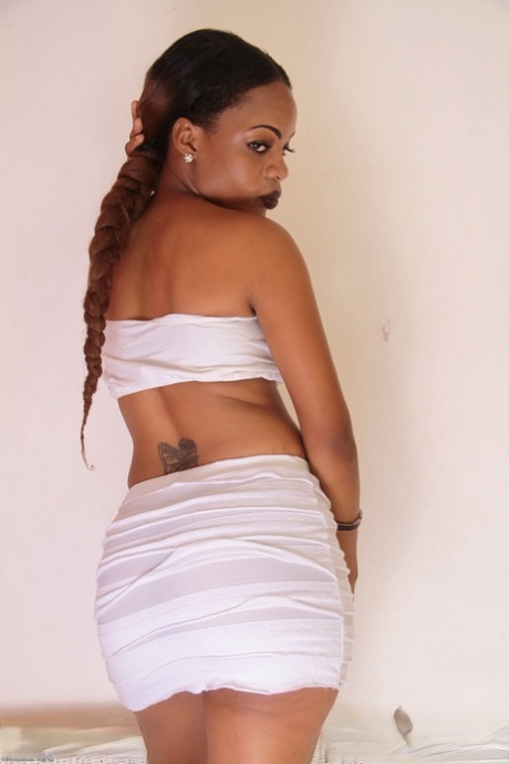 Beautiful black babe Jucie shows her small tits & spreads her shaved pussy