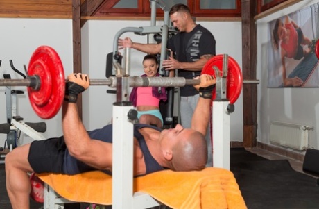 Teen Anita Bellini gets fucked by two dudes in an anal gym threesome