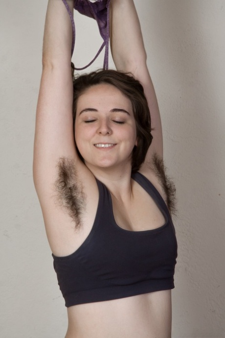 Exercise lover Harley shows very hairy armpits, legs & pussy while working out
