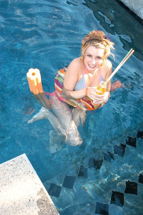 Teen Lexi Belle licks Kelly Madison's pussy in the pool before wild threesome