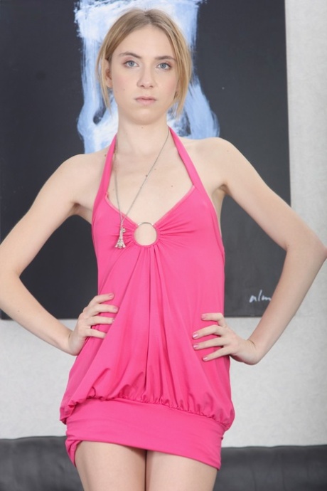 Skinny long legged amateur Isabel Stern peels to spread on leather sofa