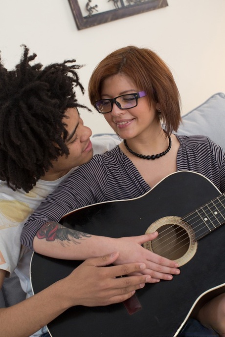 Nerdy chick Rebecca Rainbow gets banged by her black music tutor