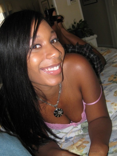 Amateur ebony goddess Rane Revere shows her chocolate pussy and juicy tits