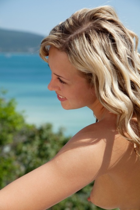 Sexy teen Luciana A unveils her beautiful body and poses on a terrace