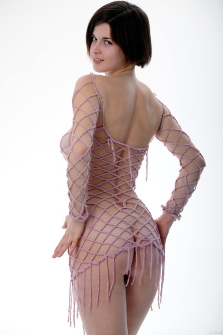Comely babe Margaret A shows her beautiful breasts & her bald pussy