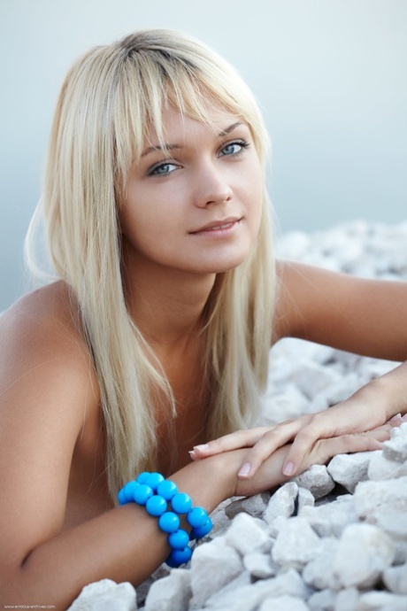 Golden-haired teen Lada flaunting her puffy nipples and trimmed snatch