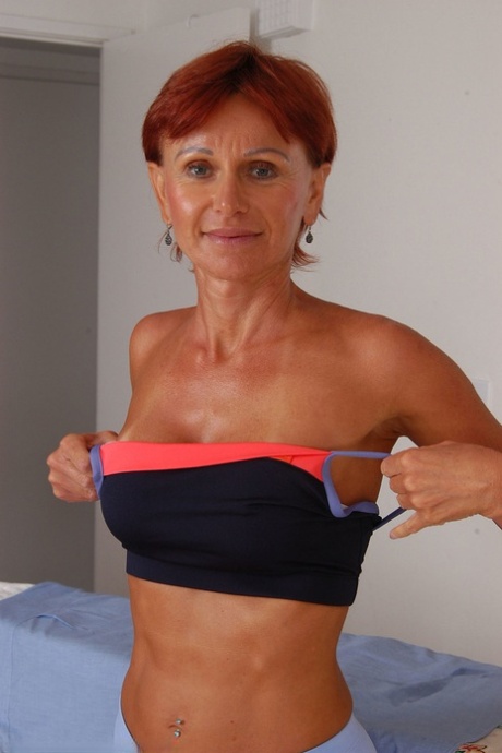 Mature woman Kate strips & shows her big tits & ass with tan lines