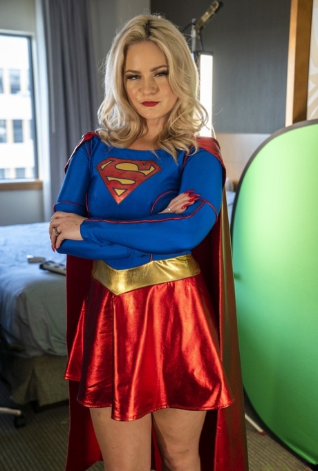 Blonde supergirl Lisey Sweet exposes her yummy ass and hot tits in a solo
