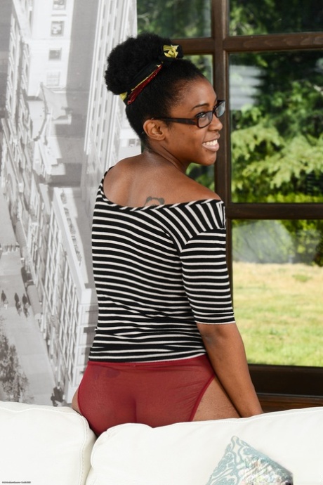 Ebony with huge ass Janelle Taylor strips and stretches her butt cheeks