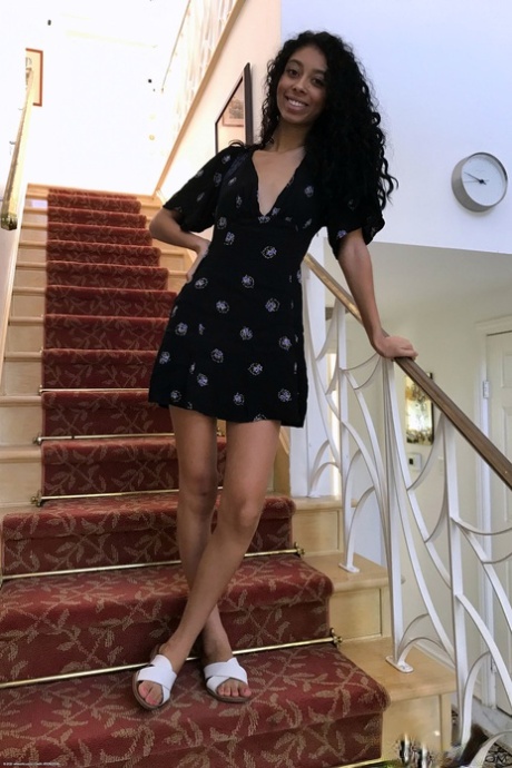 Ebony with tiny tits Jada Doll unveils her slim figure and poses in a solo