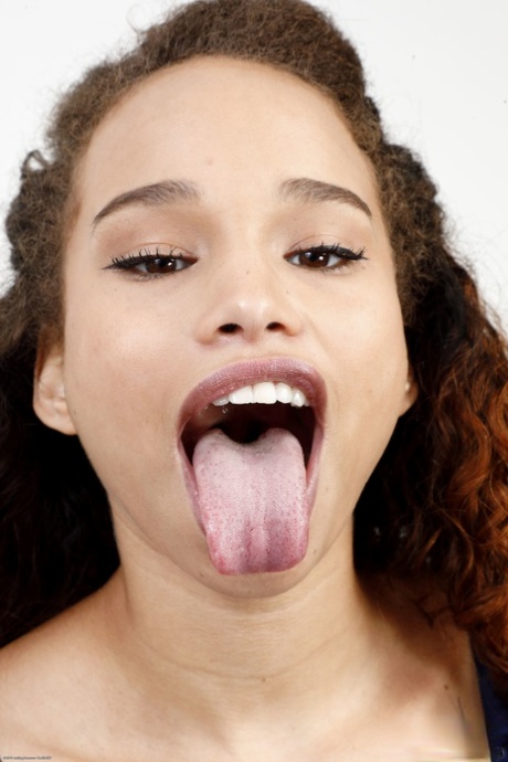 Ebony teen Cecilia Lion spreads and toys her welcoming pussy up close