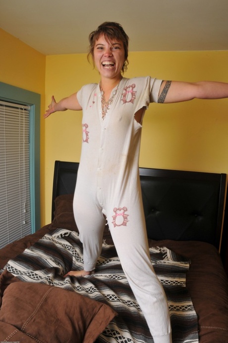Naughty teen Artemisia unveils her bushy twat and plays with herself