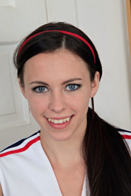 American cheerleader Veronica Radke undresses & slowly rubs her cute pussy