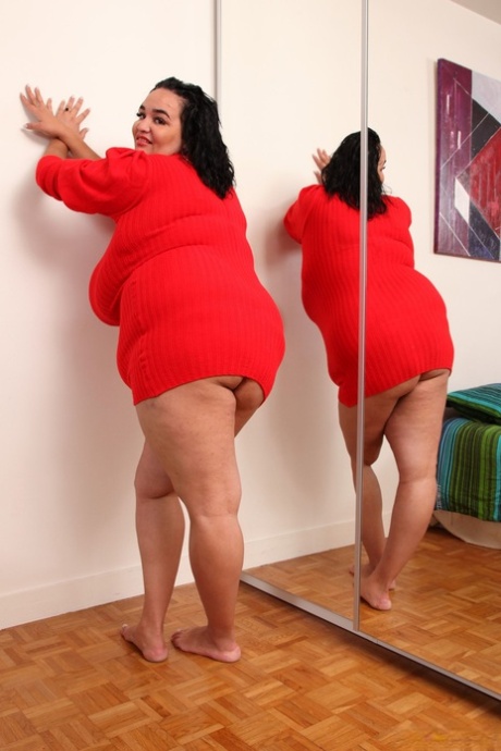Fat mature Ines reveals her monster juggs and poses naked in a solo