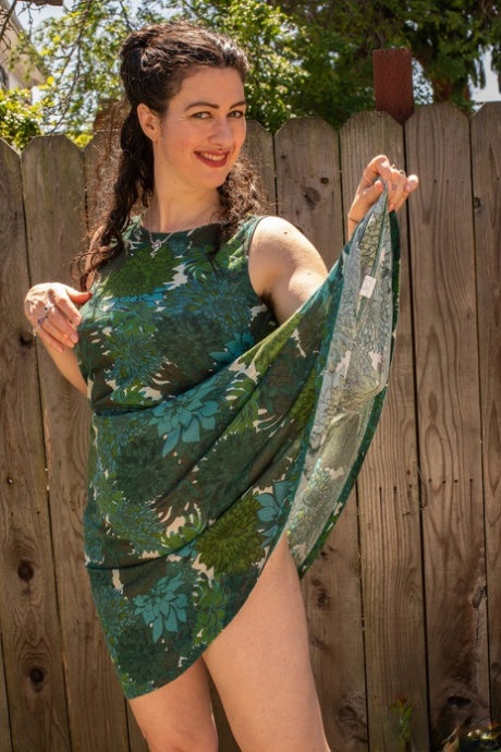 Sexy mom with small tits Sadie Lune removes her dress and flaunts her bush