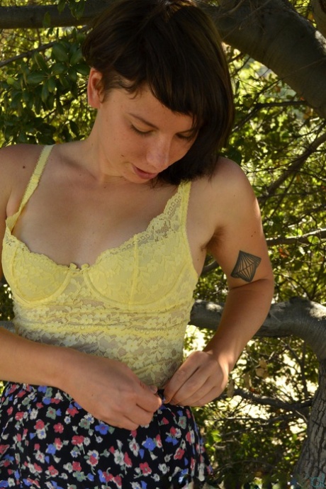 Amateur girl with tiny tits Ozzy Aqua flaunts her hairy twat and ass outdoors