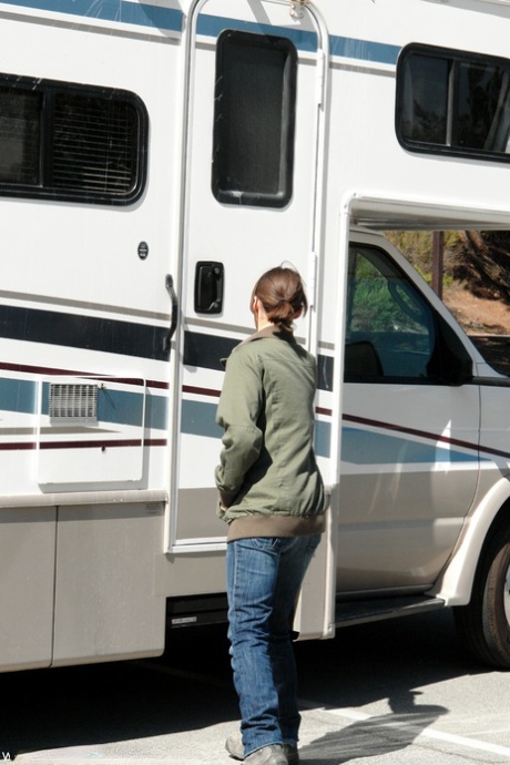 Brunette with small tits Ryan Keely gets her twat toyed by a machine in an RV