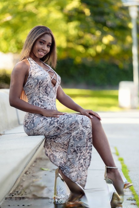 Ebony beauty Boni Brown strips her long dress & shows her muff, tits & big ass