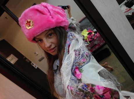 Skinny babe Melena Tara posing and fingering her beaver in a solo