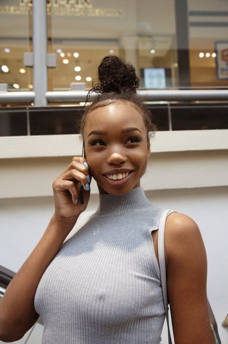 Sexy braless ebony teen Asia Amour getting naughty at the store