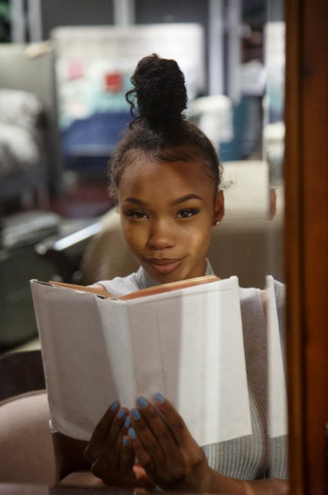 Sexy braless ebony teen Asia Amour getting naughty at the store