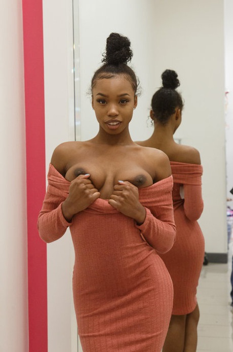 Sexy braless ebony teen Asia Amour getting naughty at the store