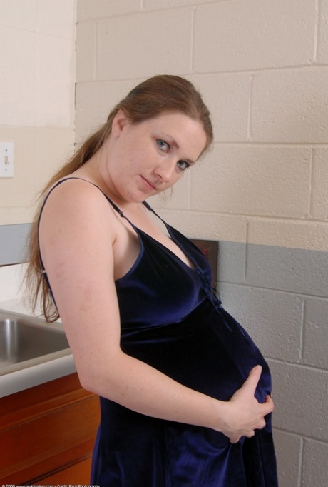 Pregnant amateur teen Rose exposes her swollen big tits and spreads her holes