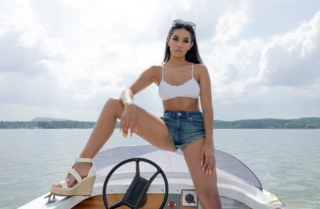 Glamorous Latina Valery Ponce spreading her trimmed pussy on a boat