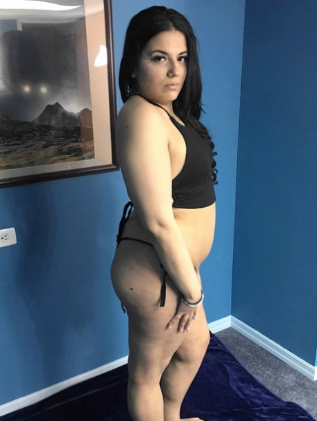 Chubby babe Stella Carter toys her shaved pussy with a pair of dildos