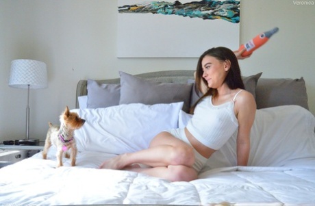 Horny babe Veronica shows her trimmed pussy up close while masturbating