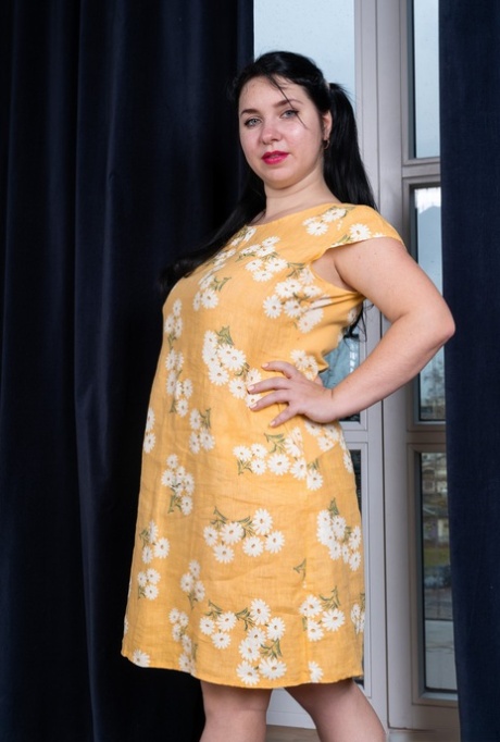 Curvaceous bombshell Tanita pounds her very hairy pussy with a dildo