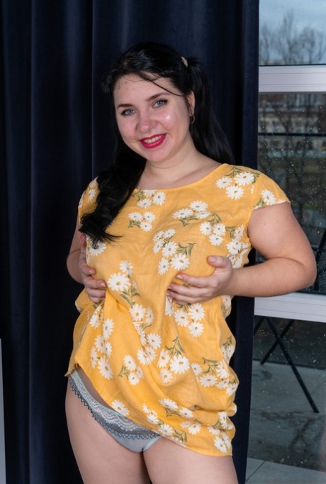 Curvaceous bombshell Tanita pounds her very hairy pussy with a dildo